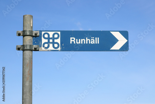 Swedish sign post pointing to a  Runhall an ancient runic inscription site