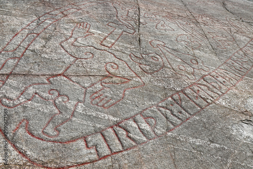 Sigurd Runestone rock carving with ancient Nordic runic inscription in Sweden