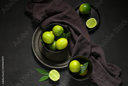 Bowls with fresh ripe limes...