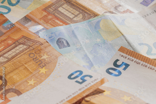 Obraz na plátně Stack of 50 and 20 Euro banknotes background