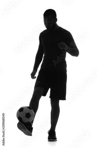 Silhouette of male soccer p...