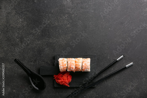 Tasty sushi rolls with chop...