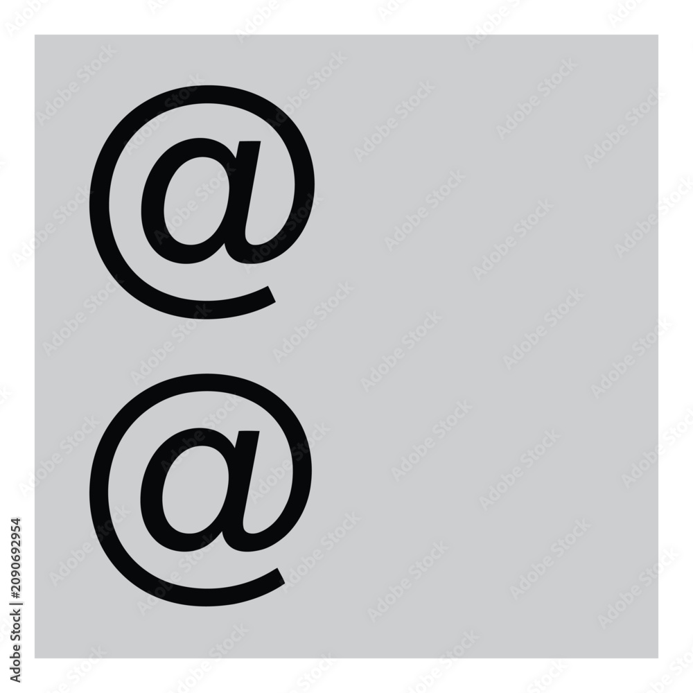 Fototapeta premium Hand-drawn stylized at symbol on grid background