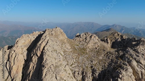 Aerial view Mount Khustup in Syunik province, Armenia. Rocky trails in scenic mountain landscape. Touristic place. Hiking trail. Adventure travel. The height of the mountain is 3,206 meters.