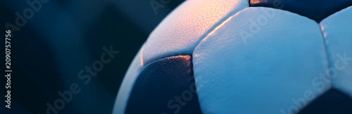 Rotating Classic Soccer Ball with Blurred Goal Net Background