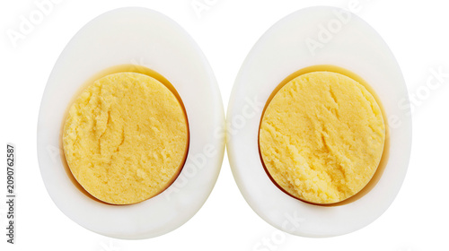 Vászonkép Two halves of a hard-boiled egg showing white albumen and yellow yolk, isolated