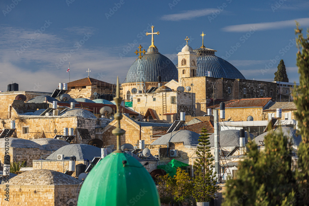 Fototapeta premium Church of the Holy Sepulchre Domes over Jerusalem Old City Rooftops.
