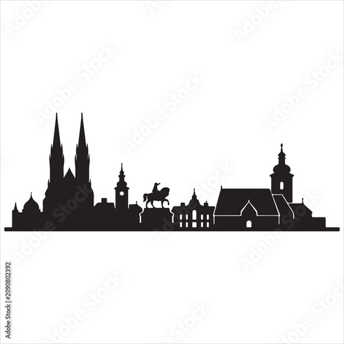 Silhouette of historic european city skyline with gothic cathedral and equestrian statue