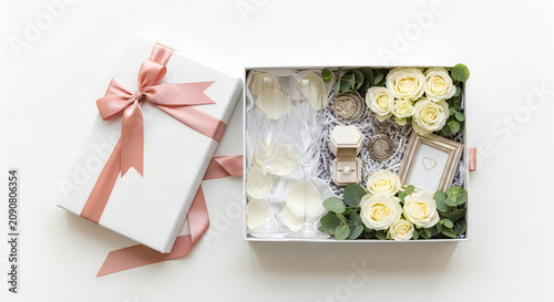 Luxury engagement gift box with champagne flutes and diamond ring