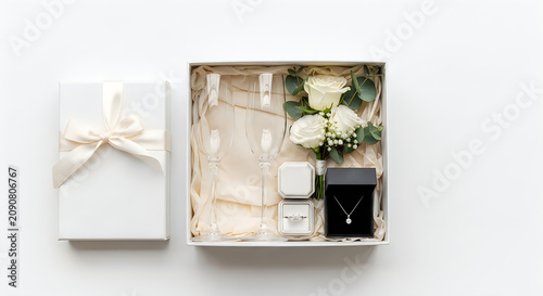 Elegant wedding proposal gift box with jewelry and flowers