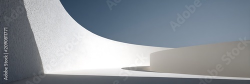 Minimalist curved white architectural walls with sharp shadows and soft daylight creating a clean geometric composition for modern interior design and structural display