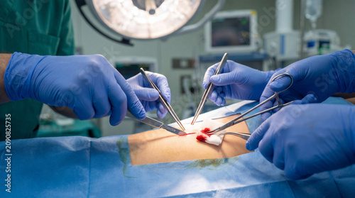 Surgical Team Performing Operation in Modern Hospital Operating Room