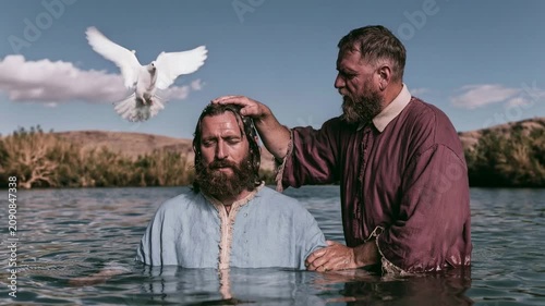 Jesus receives baptism in river with dove flying overhead