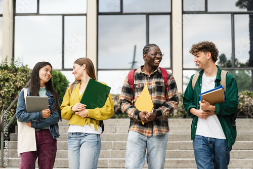 Uni Students Walking University staircase talking and Laughing, after classes and exams