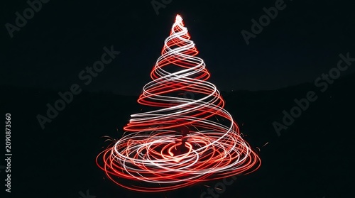 Christmas tree shape formed by red and white light trails against a dark black background