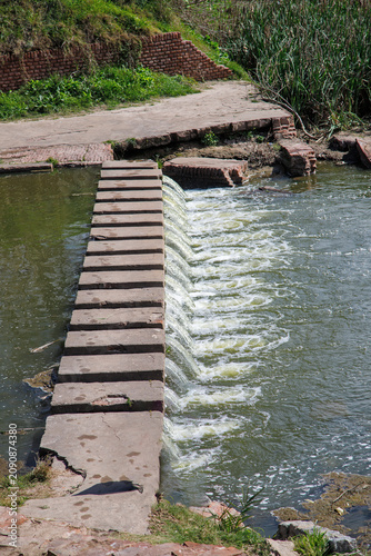 wooden bridge over the river