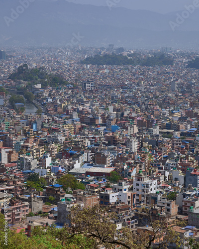 Dense urban landscape with tightly packed residential buildings in Kathmandu, Nepal

Notice the difference?