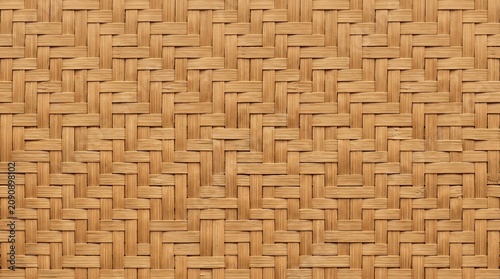 Light brown woven bamboo basket texture background pattern
