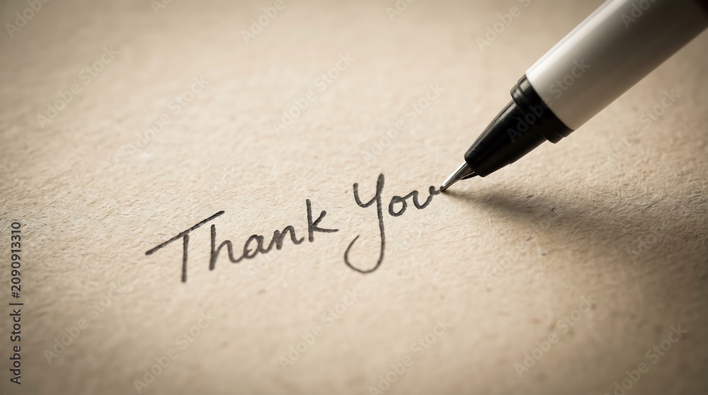 Fototapeta premium Thanksgiving gratitude handwritten 'thank you' note with elegant pen on textured paper