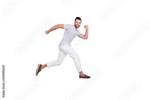 Full length body size view of his he nice attractive sportive cheerful cheery purposeful strong bearded guy running fast discount isolated over light grey pastel color background