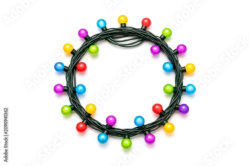 Colorful Decorative String Lights Arranged in Circular Frame Isolated on White Background for Festive Celebration and Holiday Decoration Concept