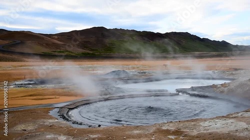 A breathtaking spectacle with the gurgling of a bubbling geyser  in Hverir (Hverarond) valley  in the Myvatn region. Iceland.
