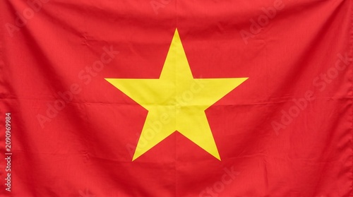 Vietnam national flag with red field and yellow star, symbolizing revolution, unity, and national identity rooted in history and cultural pride.
