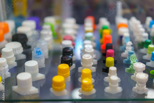 Assorted Colorful Plastic Spout Caps on Display