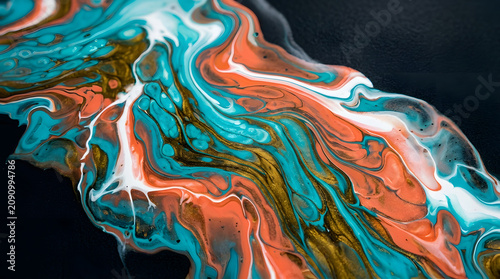 Abstract flowing liquid paint pour in vibrant tropical turquoise coral and gold tones, colorful fluid art background concept