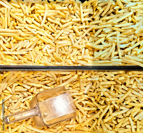 Large batch of frozen chips, ready to cook.