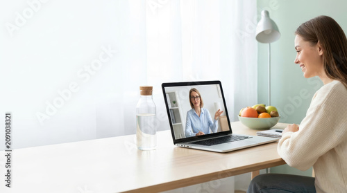 Nutritionist consulting with a client about healthy eating and meal planning