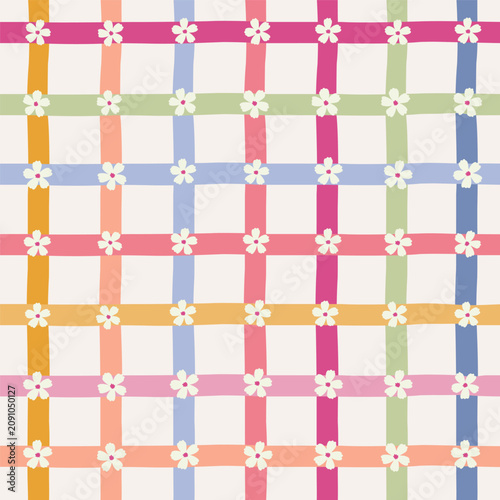 Seamless pattern with hand drawn colorful plaid grid, check, windowpane stripes and small flowers on cream background.