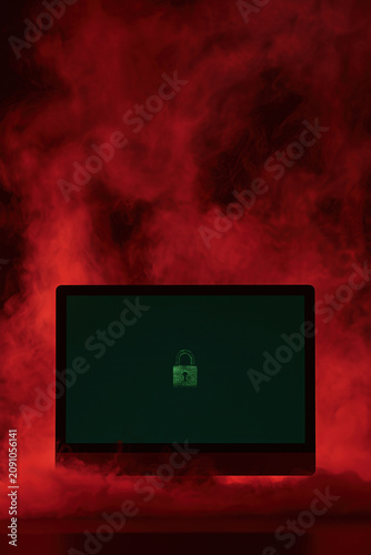 Cyber security concept with red smoke