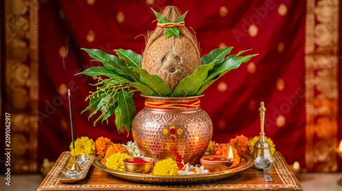Pooja Kalasam, kalasha, Hindu kalasam, sacred kalasha, puja kalash, brass kalasam, copper kalasha, silver kalasha, Vedic rituals, spiritual symbolism, pooja accessories, coconut on kalash, sacred pot.