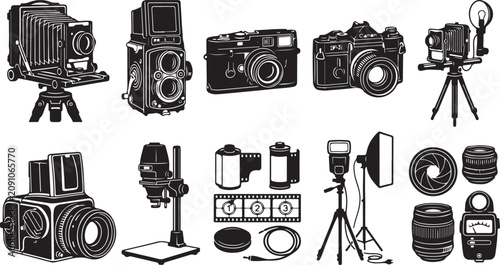 Foto Collection of vintage and modern equipment including cameras, lenses, tripods, l