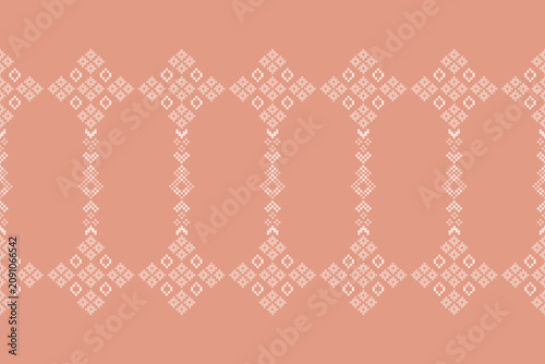 Ethnic pattern with rose gold or pink colorful background in cross stitch embroidery tribal ikat motif art.