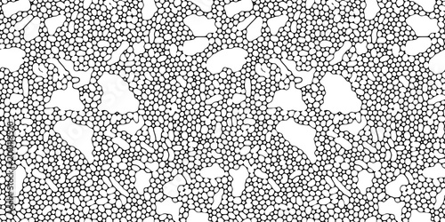 Seamless organic pebble pattern vector in black and white. Dense small cells and irregular larger voids create a coral inspired biomorphic texture