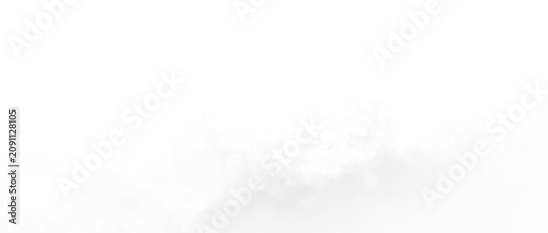 Slika na platnu Clouds gather in the sky during late afternoon with a light fog appearing in the