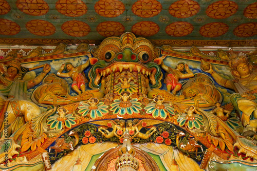 Canvas Print Traditional Makara Thorana dragon arch and colorful sculptures inside Wewurukannala Vihara temple