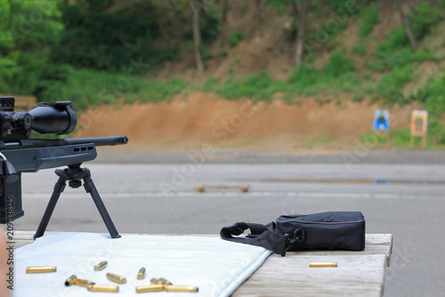 Fotografie Bolt action rifle lined up for practice at the shooting range
