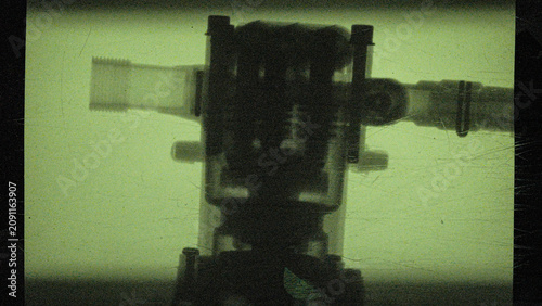 Photos the process of creating an x-ray image of a water pump, captured on camera