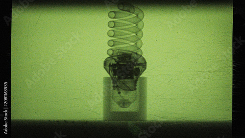 the process of creating an x-ray image of a light bulb, captured on a camera