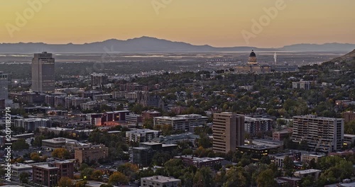 Salt Lake City Utah Aerial v33 panning from state capitol building towards the west capturing downtown cityscape with beautiful golden sunset at dusk - Shot with Inspire 2, X7 camera - October 2021