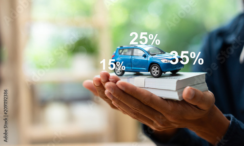 Fotografie Car on stacks of cash illustrating car financing, auto loan rates, vehicle insurance, down payment, installment planning, automotive investment, personal finance, and financial decision making