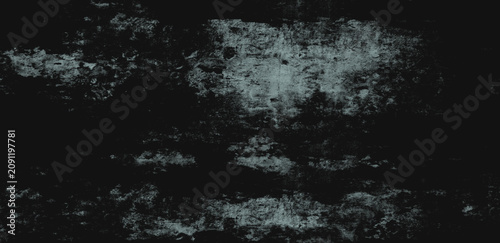Abstract dark background with distressed grunge texture and light blue highlights.