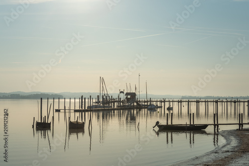 Quadro su tela Harbor and wooden pier on Lake Constance, Iznang, Hoeri peninsula, Baden-Wuertte