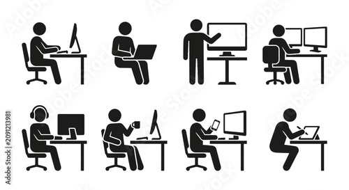 People working on computers and laptops in various ergonomic positions.