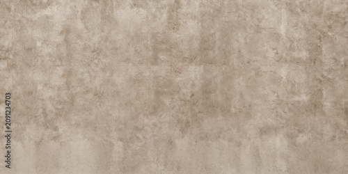 Bild auf Leinwand Textured beige plaster wall with subtle vertical streaks and variations in tone, creating a rustic and earthy backdrop