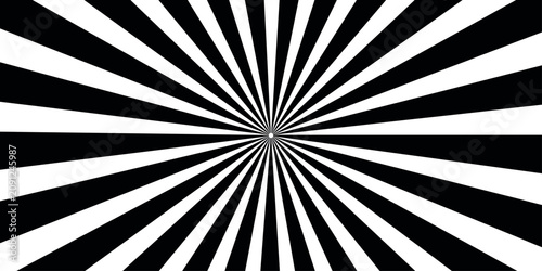 фотографія Radial burst pattern with black and white stripes, creating an optical illusion of expanding or contracting