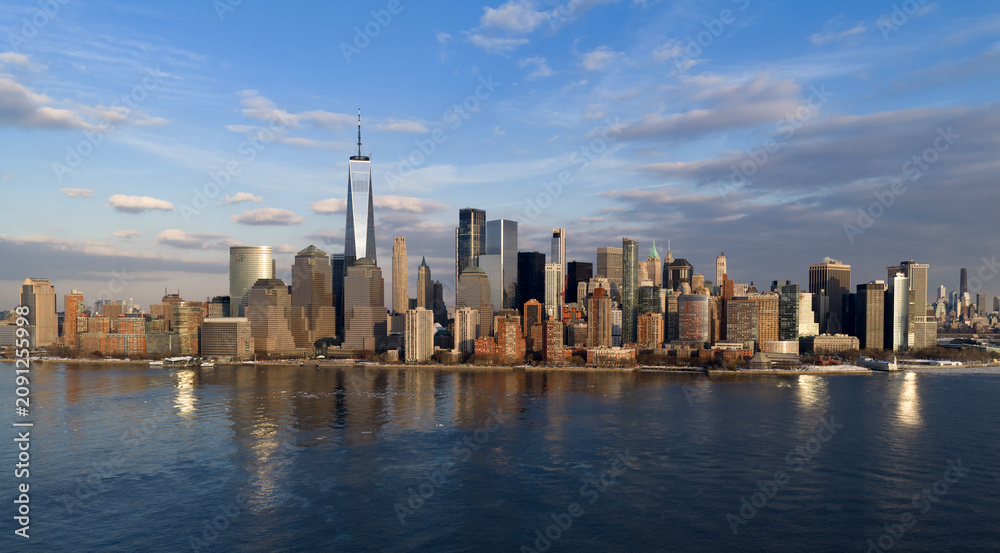 Fototapeta premium New York City skyline with skyscrapers. Manhattan aerial cityscape in NYC New York. New York downtown panorama. NYC Manhattan skyline.